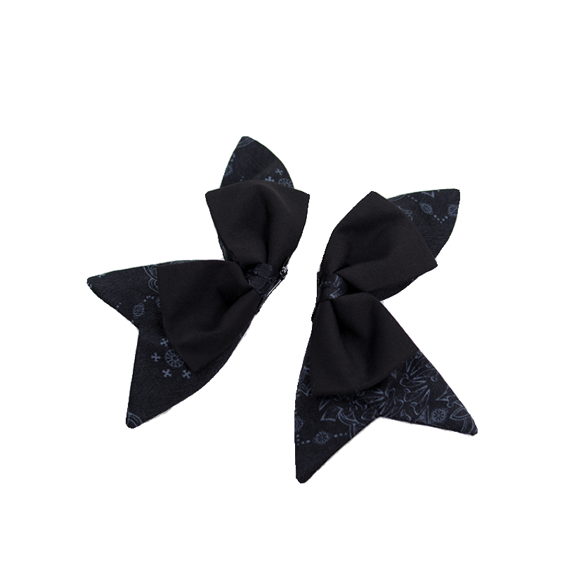 Black printed bow hair clips with layered tails shown as a pair.