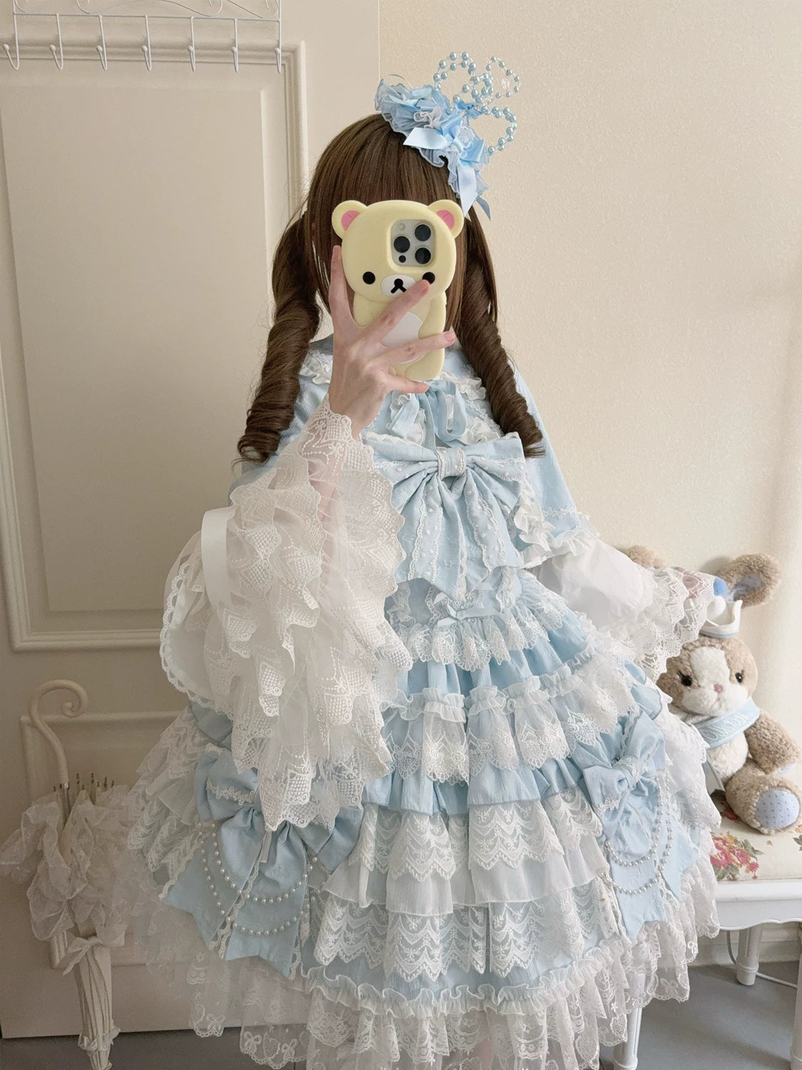 Lady Han Cross Heart Knot Sweet JSK Dress by Lolita Fetch featuring a pink and white floral print with bow accents.