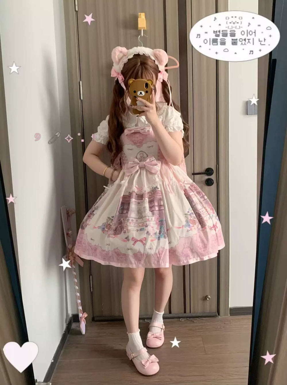 Pink-and-cream cat-and-ribbon Lolita princess dress shown on a model and in a flat lay.