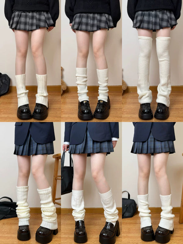 White knit sock covers shown in several lengths and shapes, including a stirrup style and lace-trimmed cover.