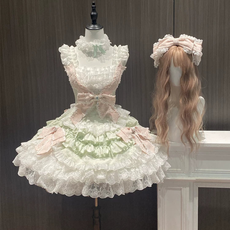 Pastel tiered Lolita skirt with lace ruffles and ribbon details on a mannequin.