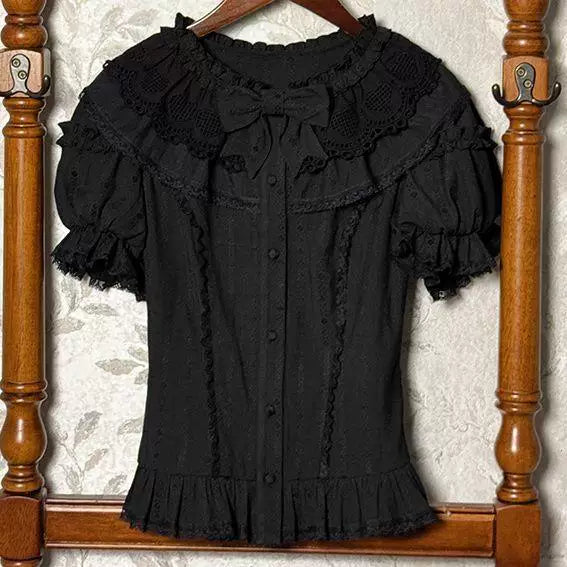 Short-sleeve puff blouse shown in flat and mannequin presentations