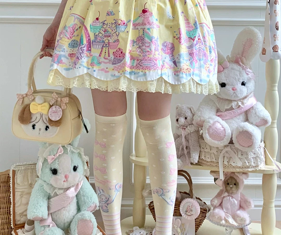 Pastel over-the-knee socks with bow motifs and striped bands in five colours