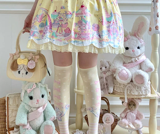 Pastel over-the-knee socks with bow motifs and striped bands in five colours