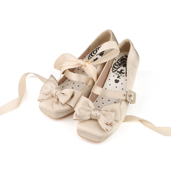 Off-white satin Lolita shoes with large bows, buckles and matching ribbons