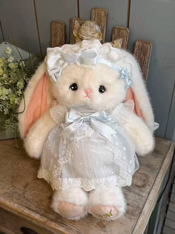 Large Lolita convertible rabbit bag in Sugar Pink, showing hand carry and crossbody strap options