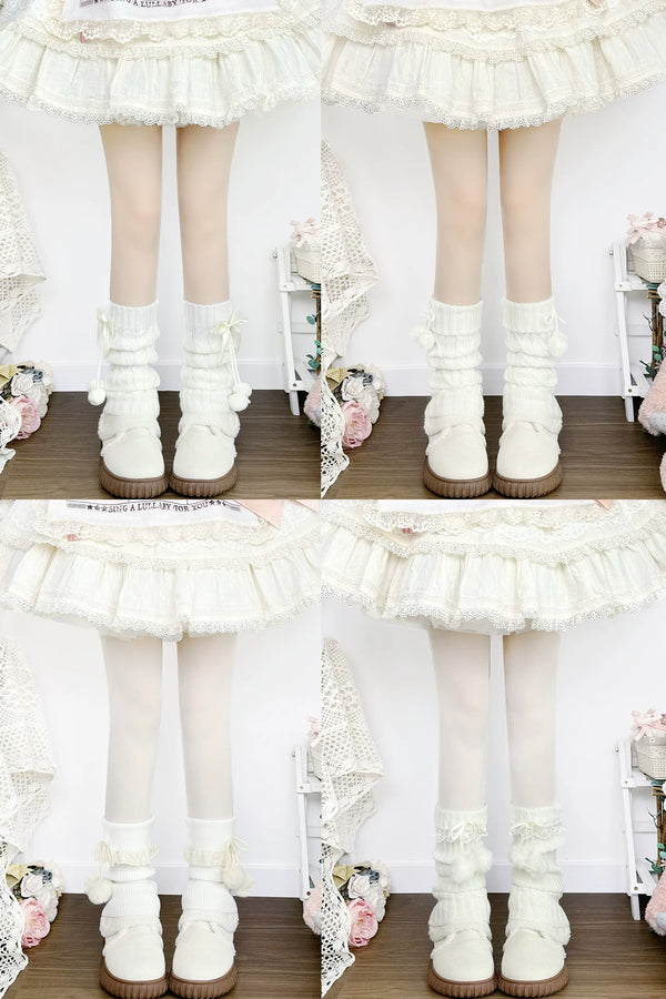 White scrunched knit sock covers with lace, bows and pom-pom details