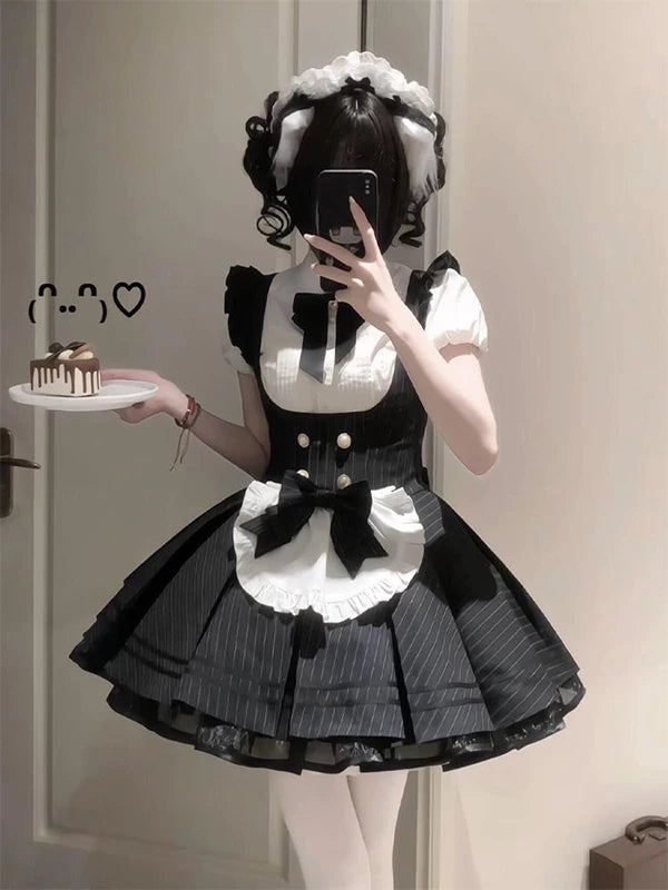 Black-and-white striped blouse and dress set shown in a mirror styling photo with a white bib front.