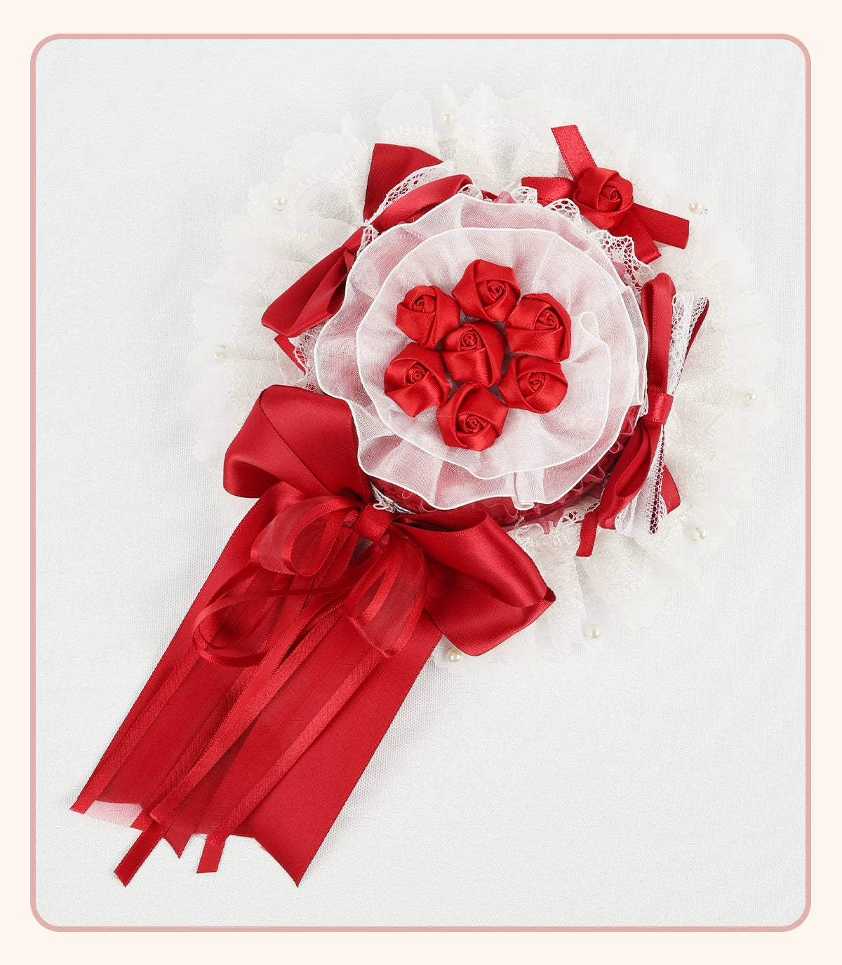 Red-and-white rose and bow headwear with layered lace and long ribbon ties