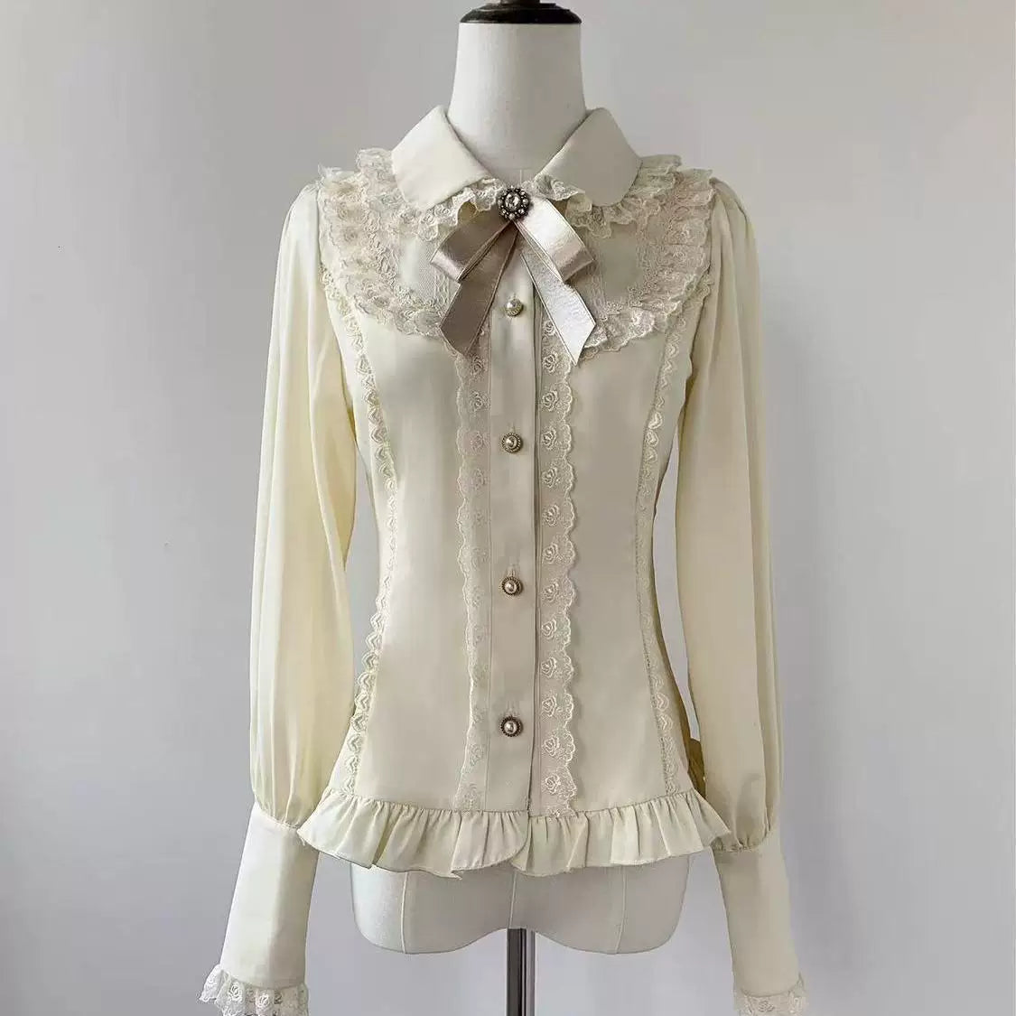 Apricot sweet Lolita long-sleeve blouse with lace trim and fitted waist