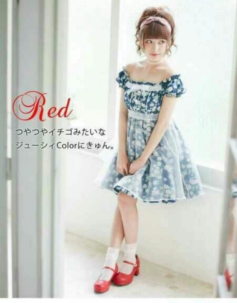 Meixie red platform Mary Jane heels styled with a blue floral dress