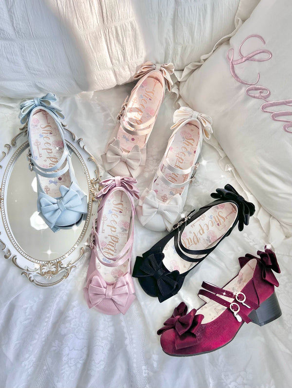 Sheep Puff Little Kate satin gloss mid heel Lolita shoes in soft pink with bow accents and glossy finish.