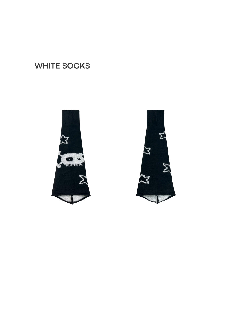 Black knit leg warmers with white skull and star graphics