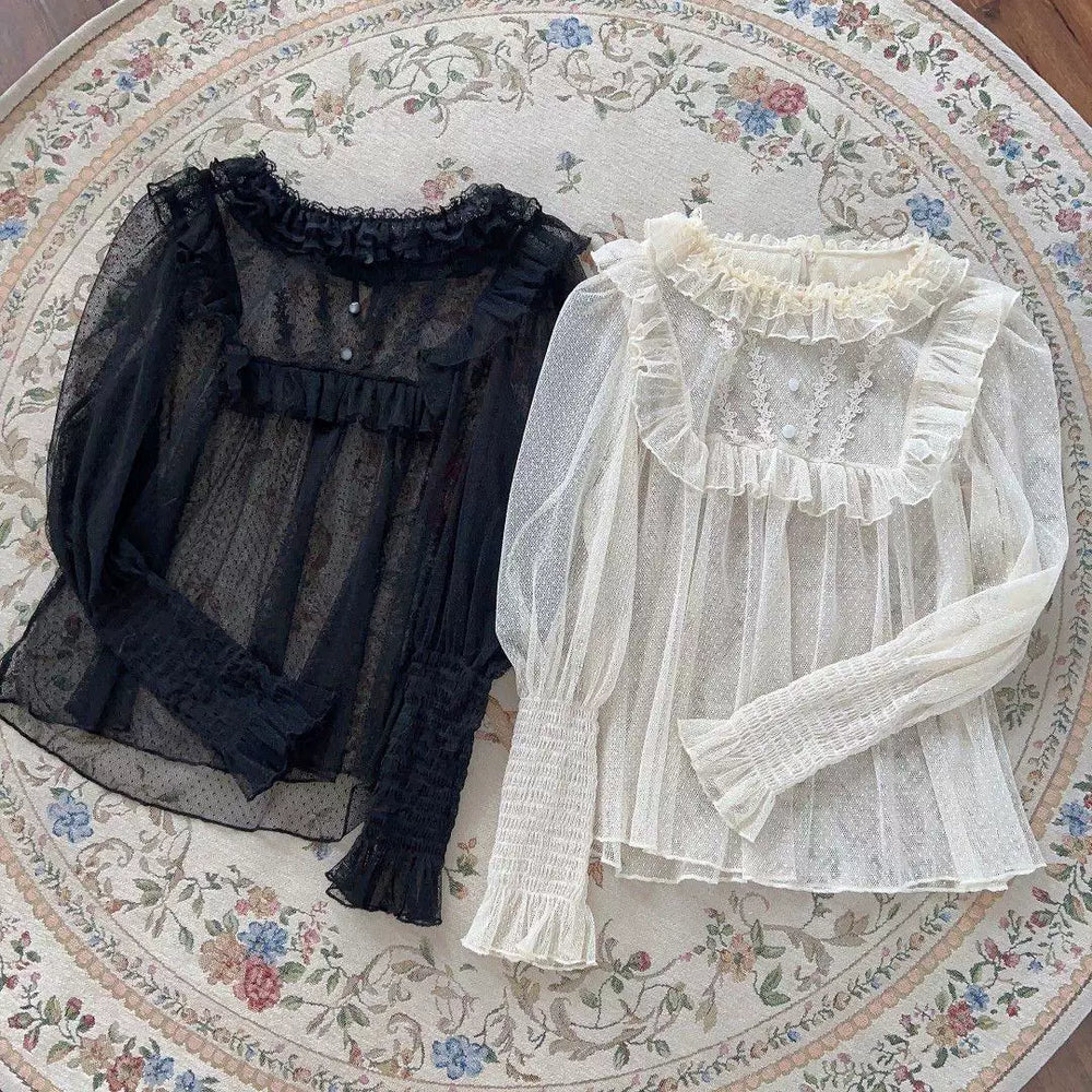 Natural-colour and black long-sleeve mesh blouses with lace ruffles laid flat.
