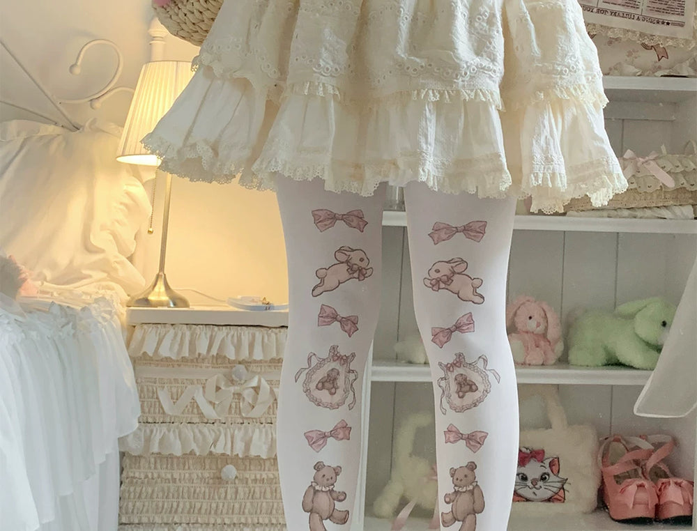 Printed tights with teddy bears, ribbon bows, and striped and unstriped options shown on a model.