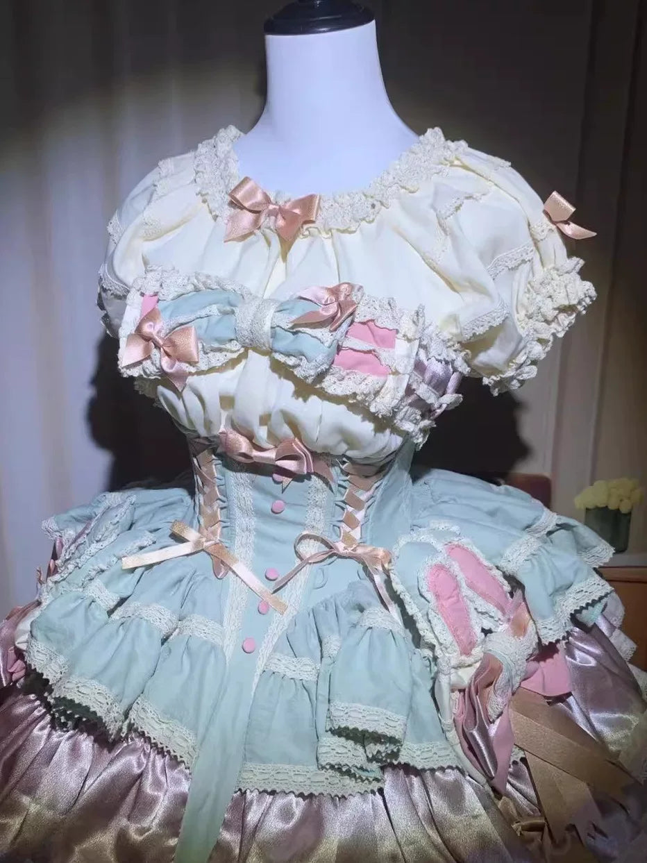 Rice-yellow short-sleeve Lolita princess dress with layered bows on a mannequin