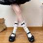 White socks, black bow / One Size