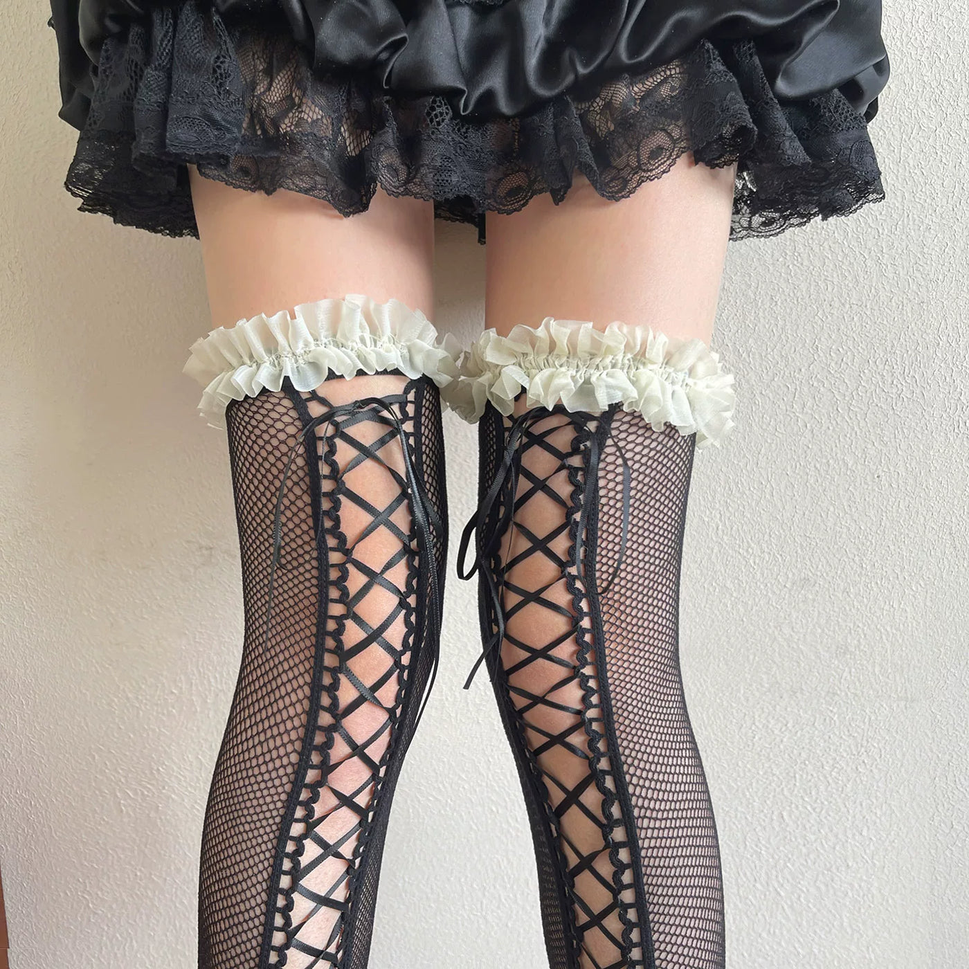 Black style Y2K ballet lace over-knee sock with criss-cross ribbon lacing and ruffled trim