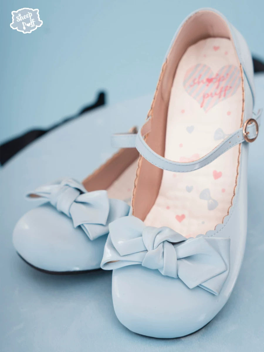 Sheep Puff Satin Gloss Lolita Shoes with rounded bow detail, glossy finish, and elegant design for stylish footwear.