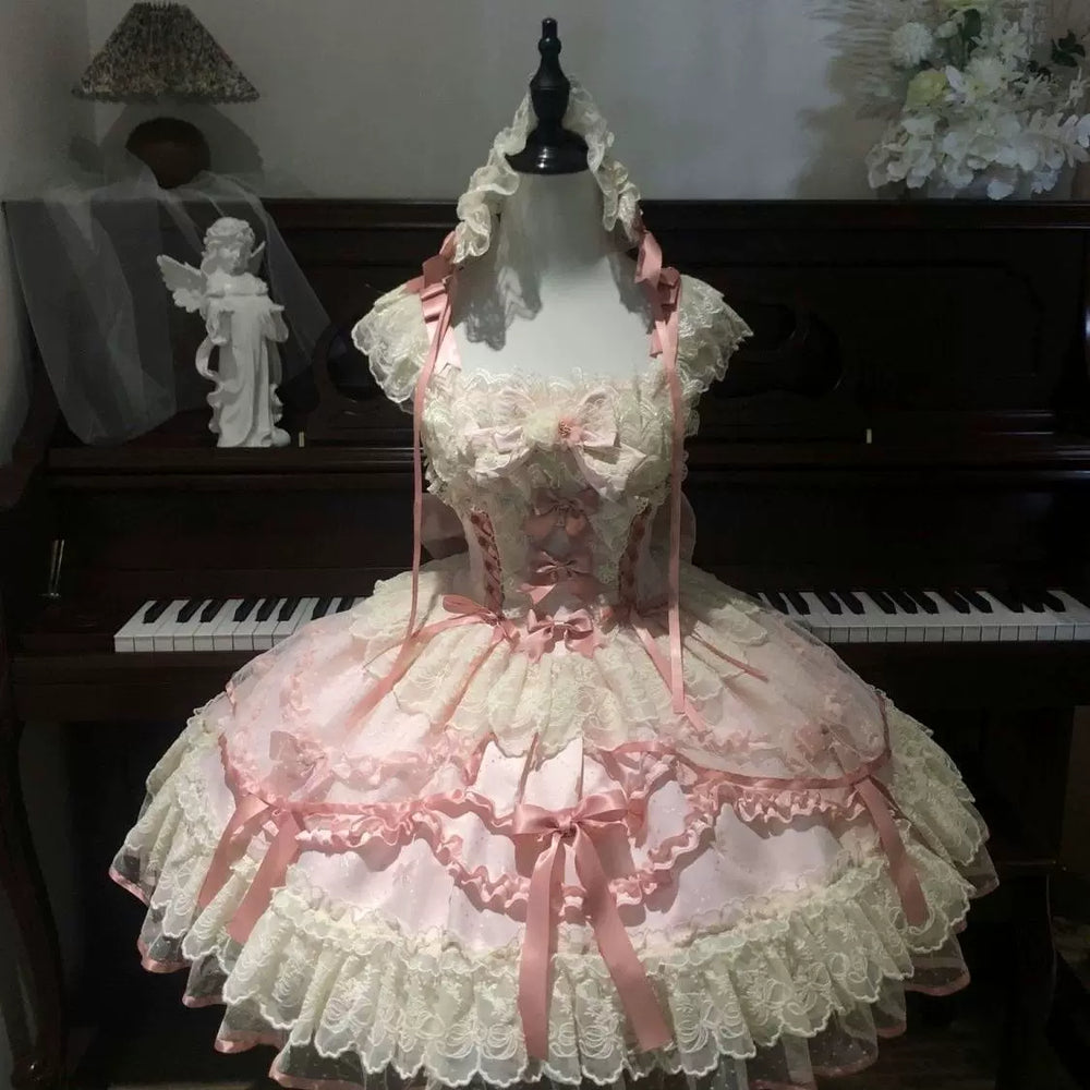 Blush pink and cream sweet lolita JSK dress with square neckline and satin ribbon bows
