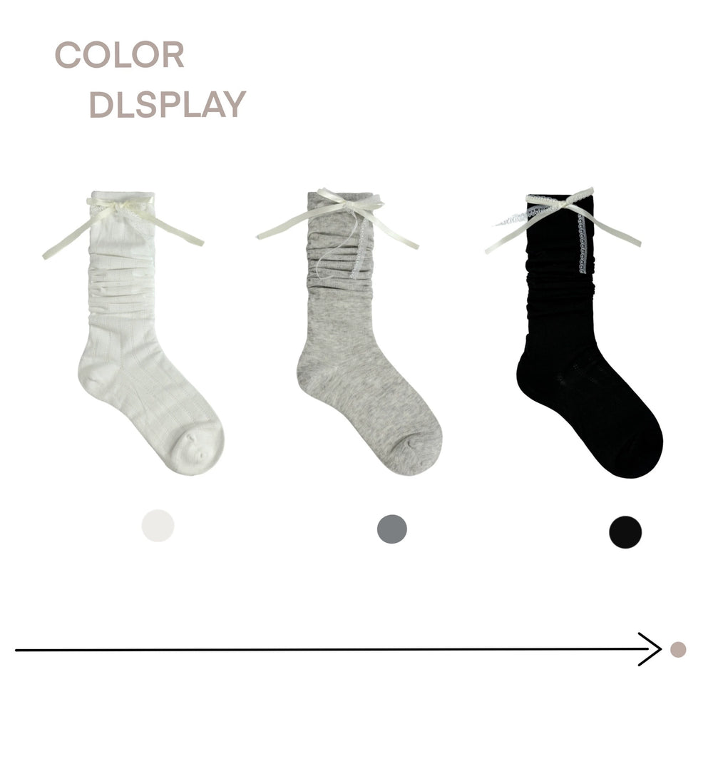 White Socks mesh slouch socks in white, grey and black with lace bow ties