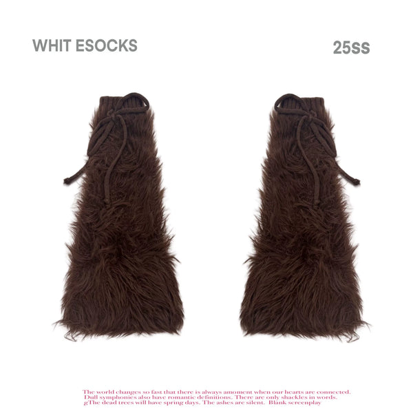 Shaggy black and cream mid-calf leg warmers with tie details shown with skirts and shoes.