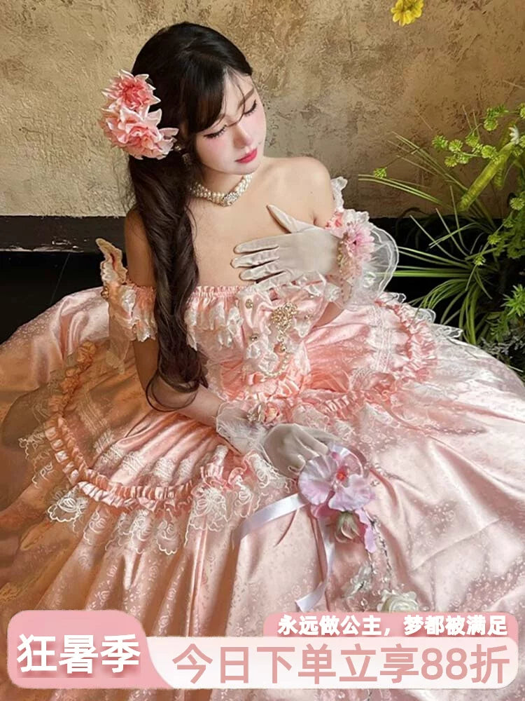 Pink off-the-shoulder lolita ball gown with sweetheart neckline and tiered skirt