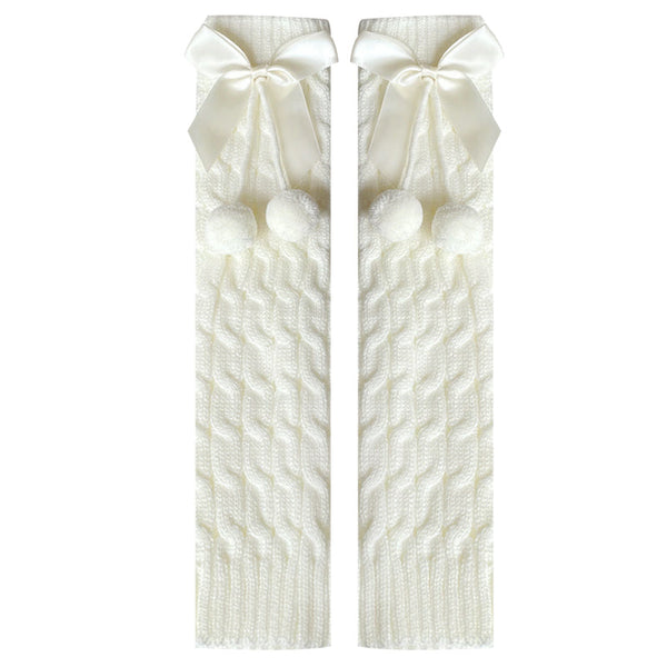White knitted leg warmer pair with large bows and small pom-poms