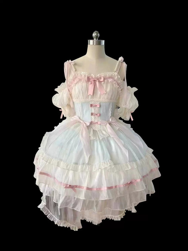 Creamy green-pink JSK dress set with layered ruffles and train on a mannequin