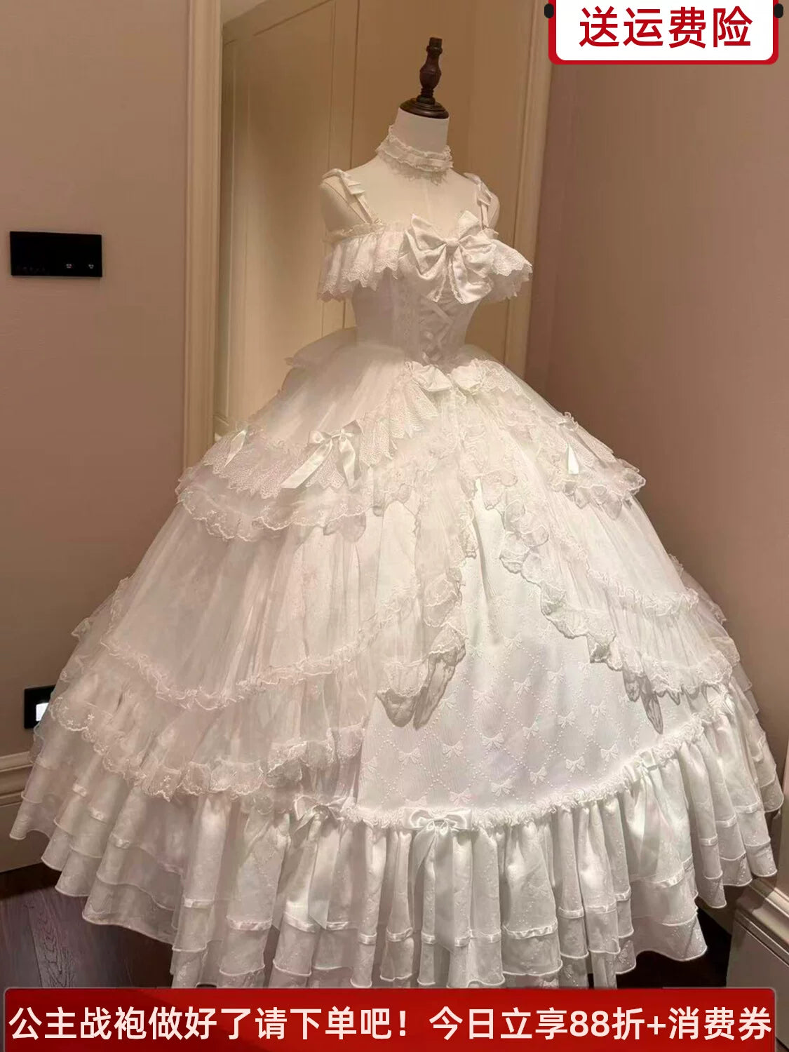 Emoji Dream white Lolita ballgown with off-the-shoulder neckline, lace trim, and tiered skirt displayed on mannequin