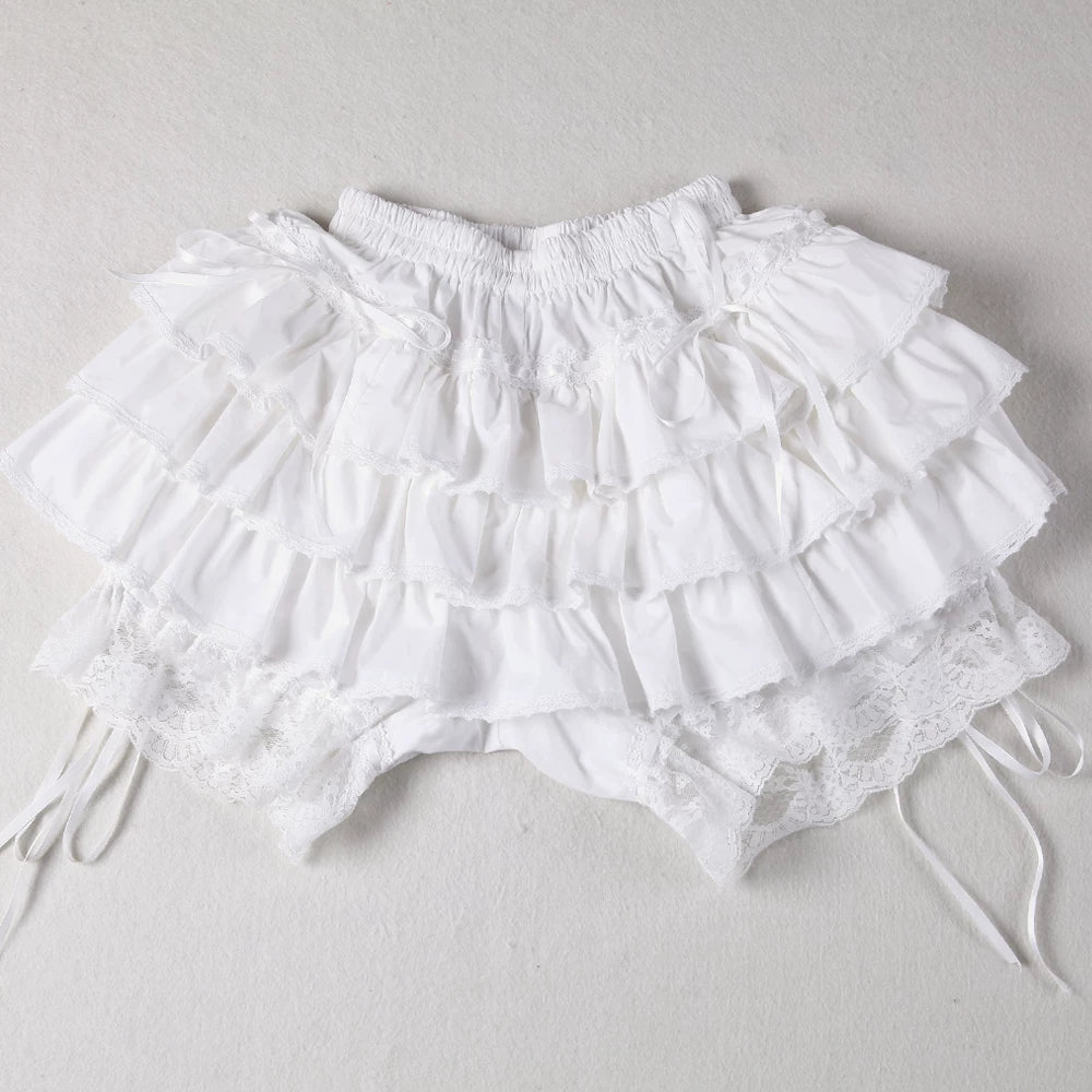 Milky-white layered ruffle skirt with pumpkin shorts shown with a cream top and lace details.