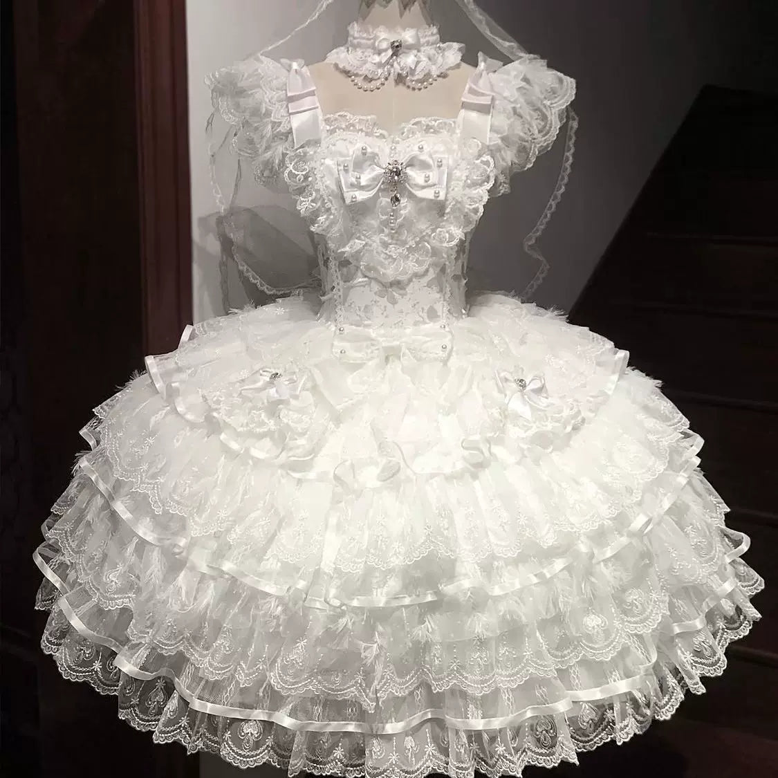 Lady Han Feather Ballad Bridal Sweet JSK dress featuring delicate feather details and elegant lace accents, perfect for special occasions.