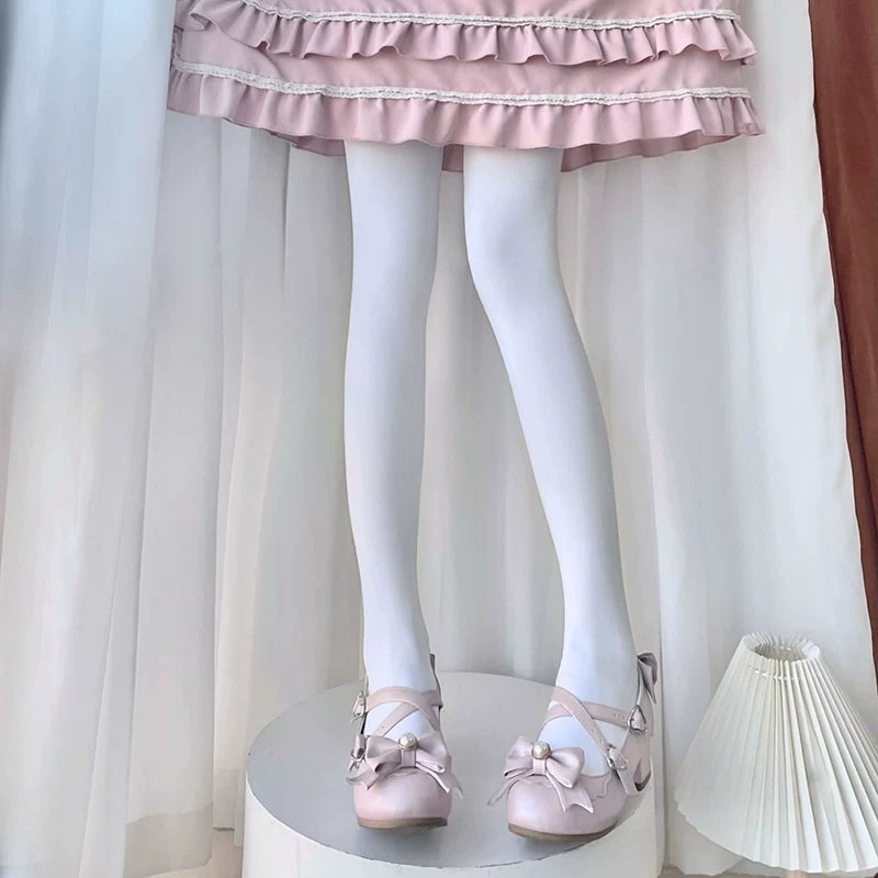 White footed tights styled with a pink Lolita outfit