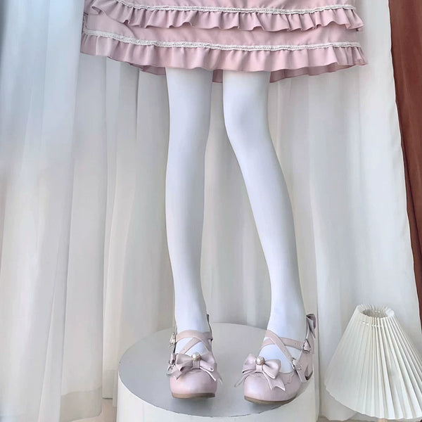White footed tights styled with a pink Lolita outfit