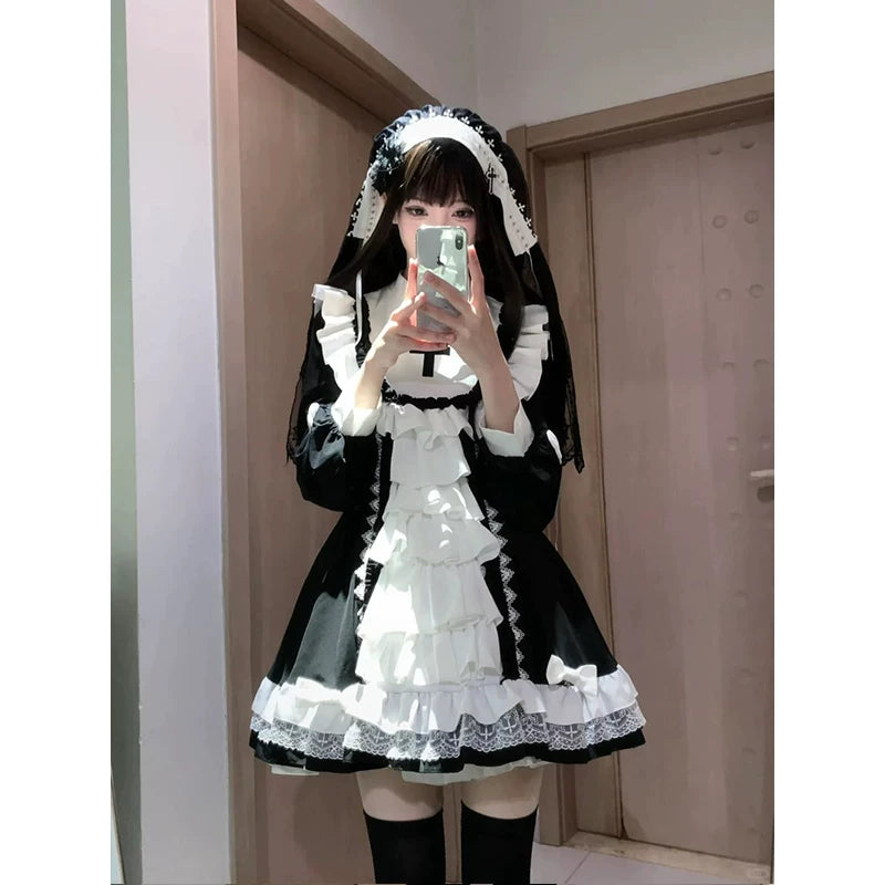 Black-and-white short Lolita dress with white ruffles, puff sleeves and a chest cross motif.
