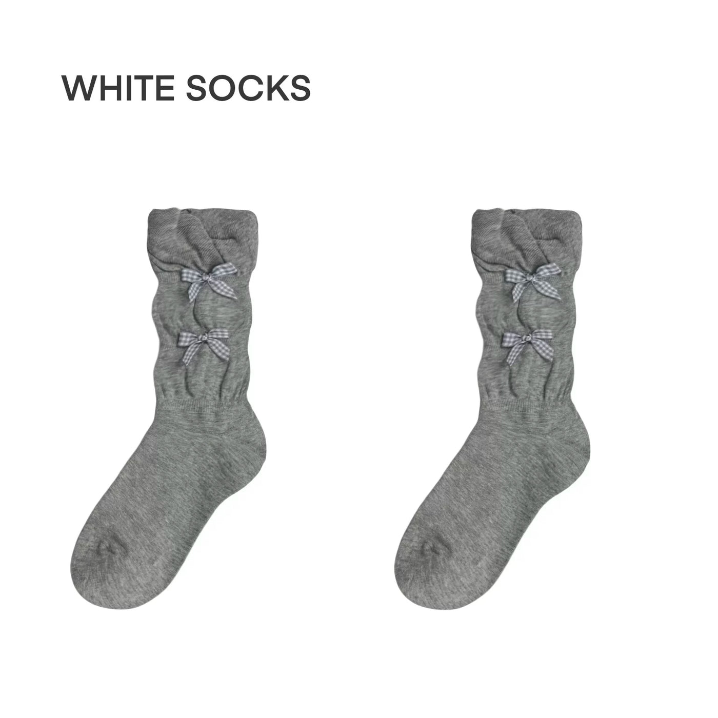 Grey slouch socks with small bow accents styled with silver Mary Jane shoes.