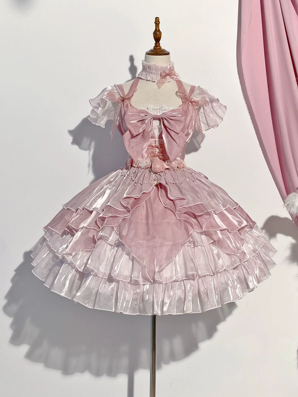 Creamy pink JSK with tiered ruffles and oversized bow