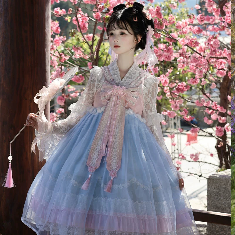 Lady Han Peach Spring Chinese JSK dress by Lolita Fetch featuring a pastel peach-colored fabric with floral patterns and bow details.