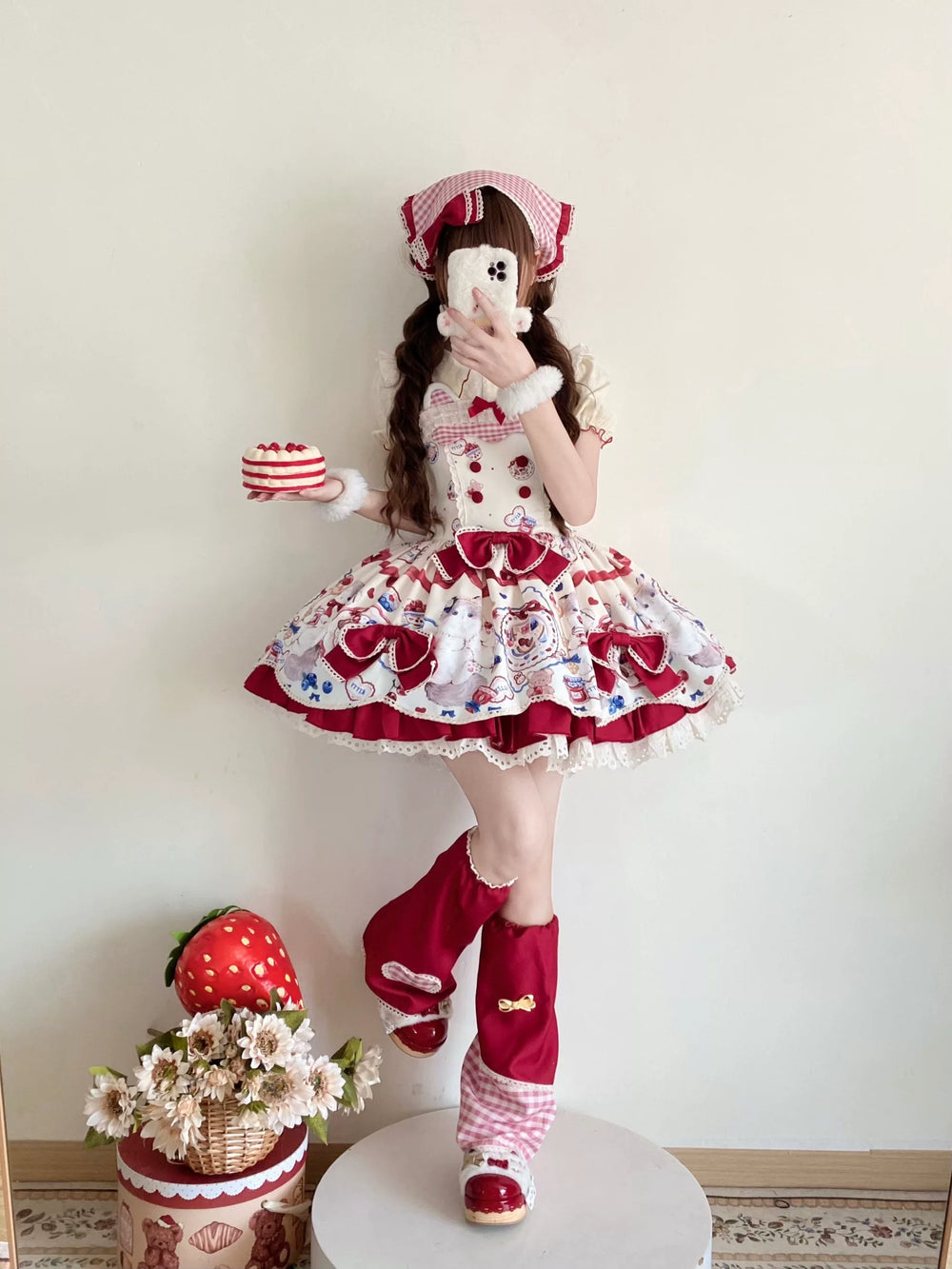Pink dessert-print JSK dress with red bows and lace trim.