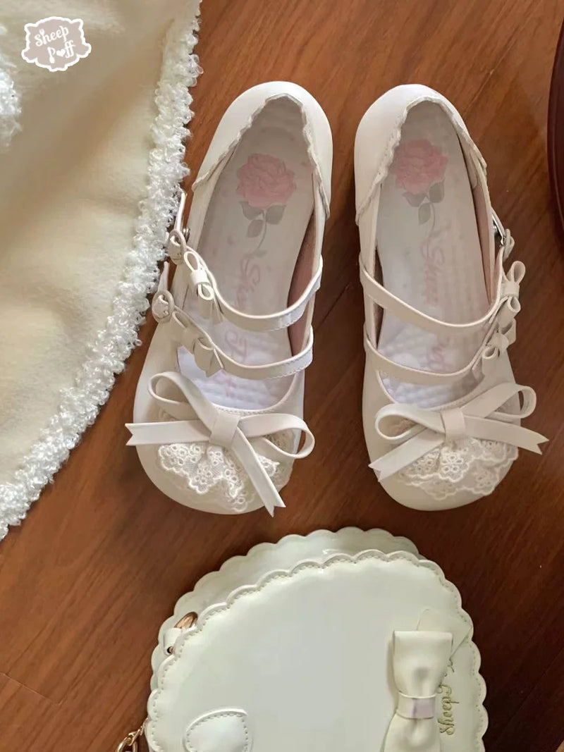 Sheep Puff Lace Bun Lolita Shoes featuring white lace detailing, rounded toe, and decorative bows for a cute, elegant look.