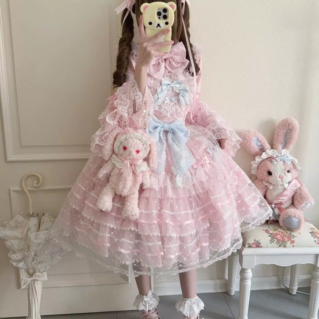 Lady Han Camellia Cherry Overture sweet JSK dress by Lolita Fetch, featuring a floral cherry blossom pattern on a pink fabric.