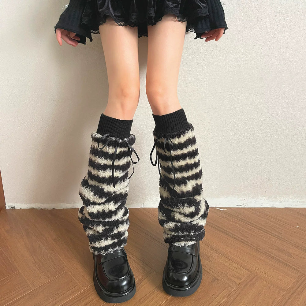 Sock Noble black and cream striped fluffy leg warmers with ribbon ties