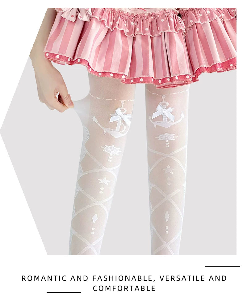 White over-the-knee stockings with crossed lines and star motifs worn beneath a pink skirt.