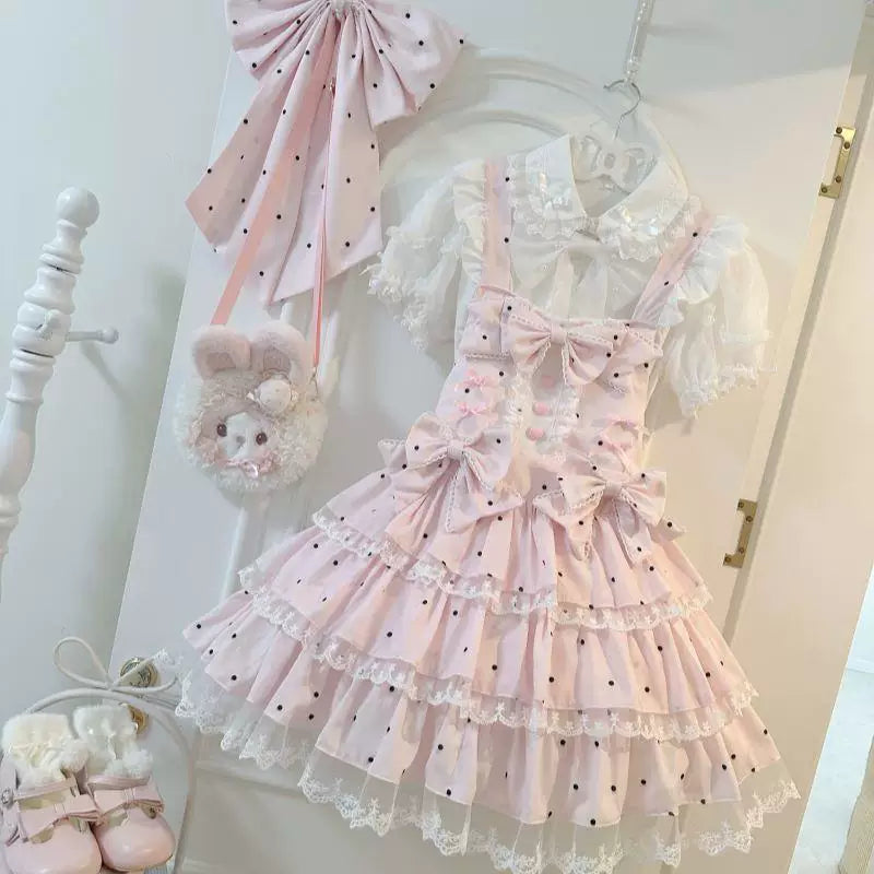 Sweetheart Dream Machine pink polka-dot JSK dress with bow, lace edging, and tiered skirt