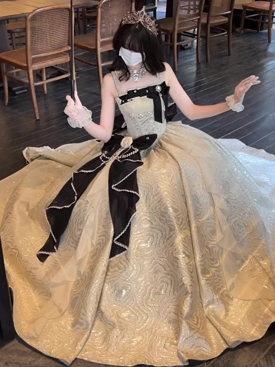 Pink long-length Gothic Lolita formal dress with fitted bodice and full layered skirt