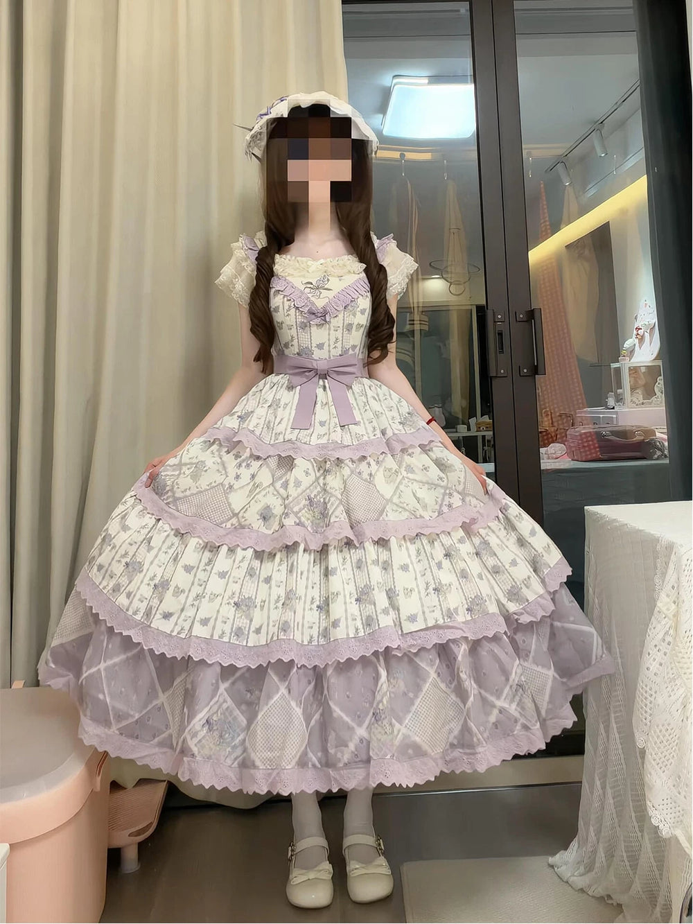 Purple embroidered JSK dress with layered full skirt, belt, bow, and hat styling.