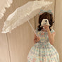 Beige folding parasol - transparent UV layer - self-fabric trim