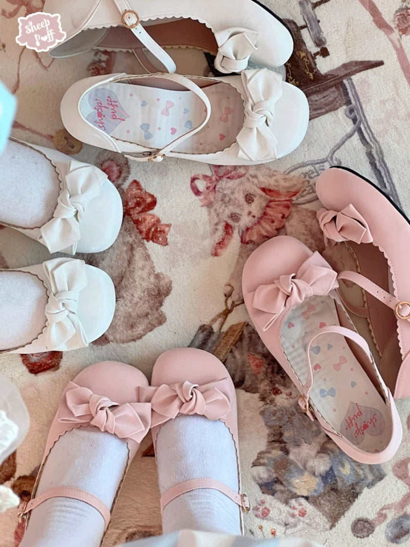 Sheep Puff Satin Lolita shoes with rounded bow and glossy finish, featuring a cute and elegant design.