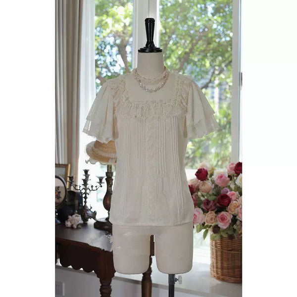 Sweet Lolita blouse in soft neutral tone with square neck and flutter sleeves