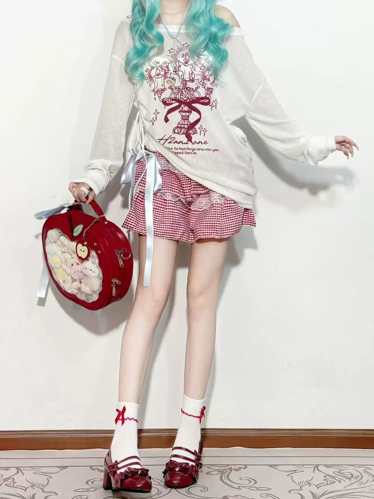 Fantasy Doll white mid-calf socks with red trim and bows styled with red shoes.